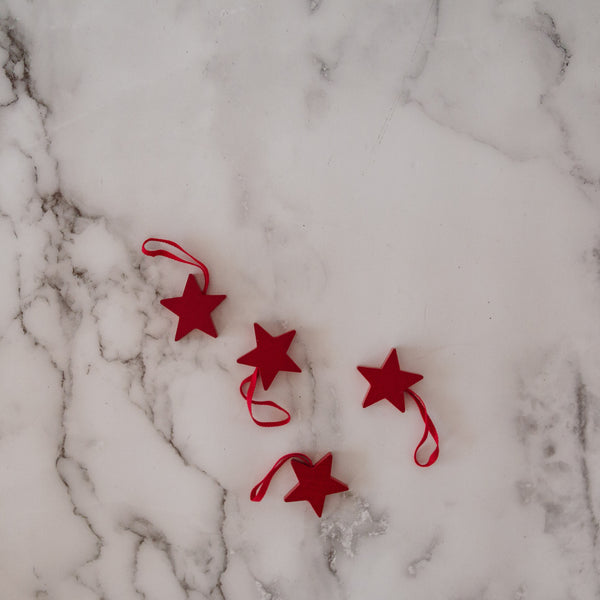 red wooden star ornament